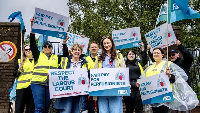 <p>Perfusionists and supporters picketing outside Cork University Hospital as part of a campaign for pay parity. Picture: Chani Anderson.</p>