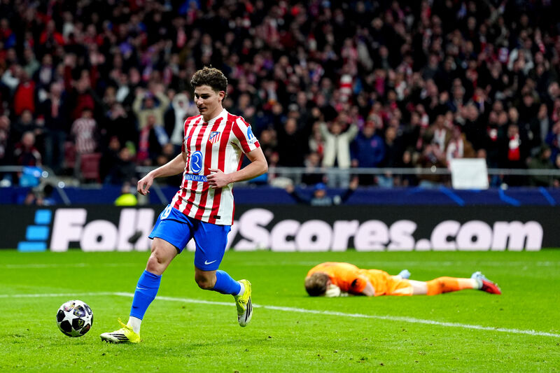 Atletico Madrid's Julian Alvarez scores their side's third goal of the game during the UEFA Champions League match at the Metropolitano in Madrid, Spain.