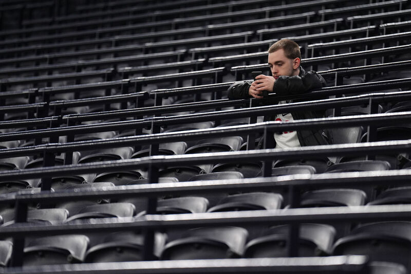 A Tottenham Hotspur fan appears dejected in the stands after the Premier League match against Crystal Palace at the Tottenham Hotspur Stadium, London. Picture: John Walton/PA Wire