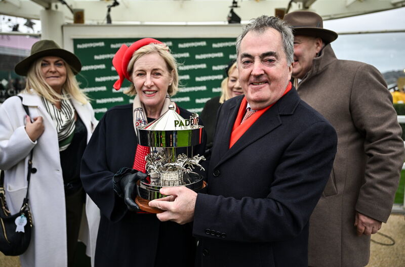 REBEL YELL: Owner Sean O'Driscoll celebrates with the trophy after Home By The Lee won the Paddy Power Stayers' Hurdle at Prestbury Park. Picture: David Fitzgerald/Sportsfile