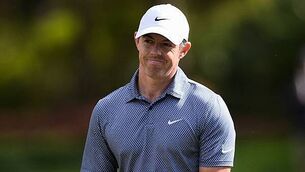 Rory McIlroy struggles with back problems to two over at Players Championship
