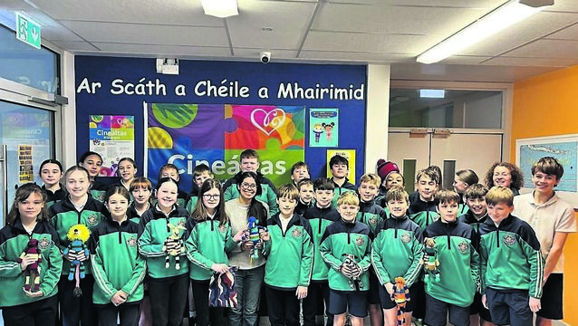 <p class="contextmenu internal_Caption">Fifth class at Gaelscoil Mhichíl Uí Choileáin, with activist Paula Ferro in January, as part of the Our World Awards scheme</p>