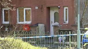 <p> A Garda cordon remains in place at a house at Innishmore Park, Ballincollig Co Cork on Saturday morning after the discovery of the body of a woman on Friday evening. Picture: Larry Cummins</p>