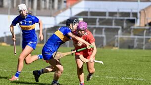 <p> Orlaith Cahalane battles for Cork against Tipperary full-back Mairead Eviston at</p>