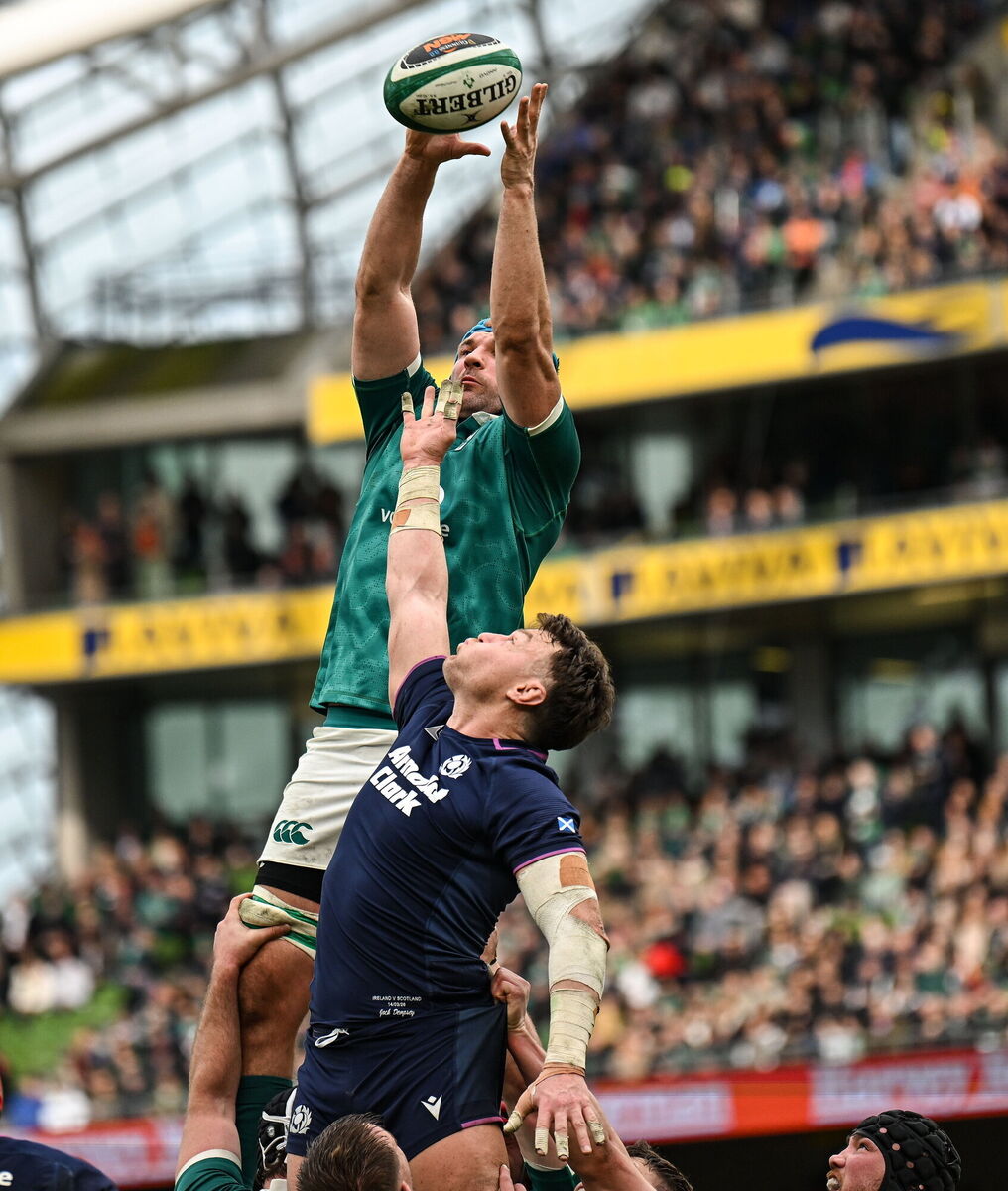 Tadhg Beirne of Ireland wins the lineout against Jack Dempsey of Scotland. Picture: Ramsey Cardy/Sportsfile