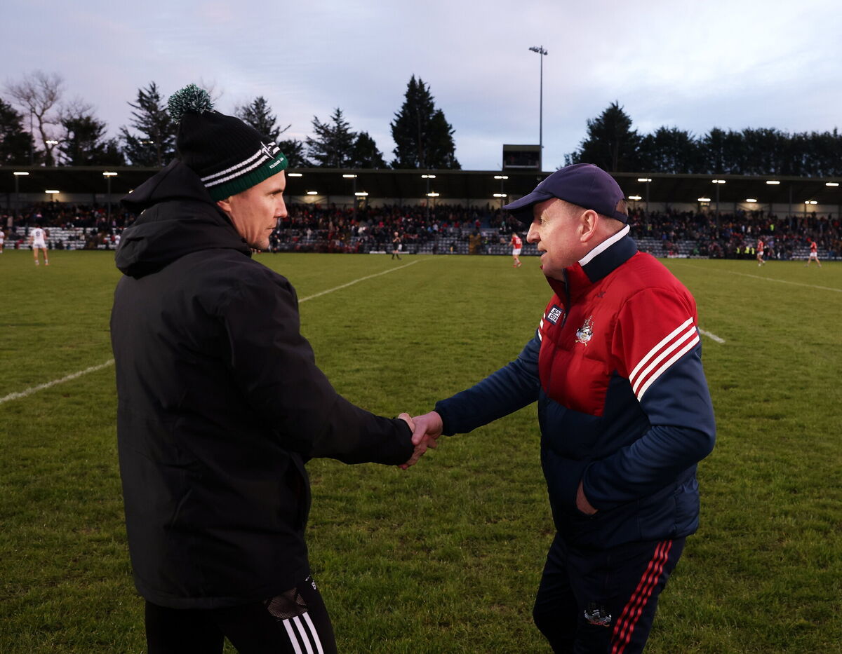 Cork manager John Cleary shakes hands with Kildare manager Brian Flanagan after the game. Picture: Michael P Ryan/Sportsfile
