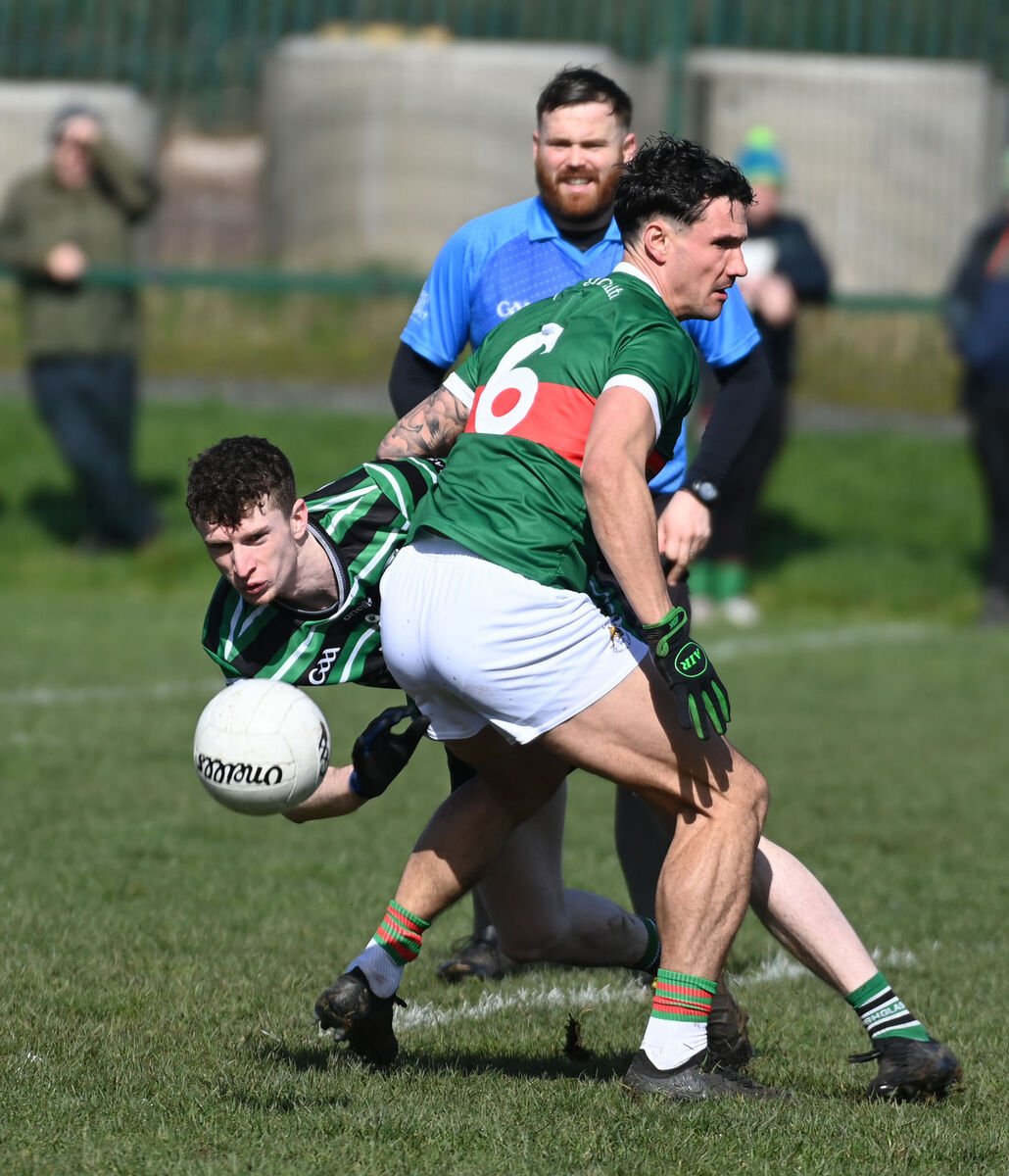 Douglas' Adam Cantwell and Clonakilty's Thomas Clancy tussle for the ball. Picture: Eddie O'Hare