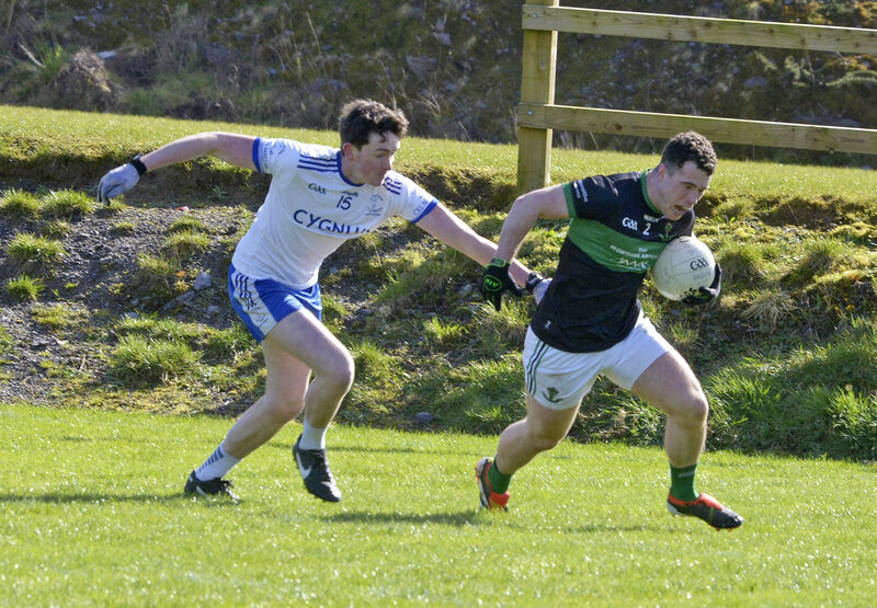 Cill Na Martra's Antaine Ó Loingsigh tackling Nemo's Daniel Quinn. Picture: Denis Boyle