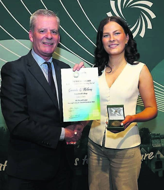 Denis Leamy, chief executive Cork ETB, presenting The Board Medal (625pts) to Caoimhe O’Mahony, Coachford College.