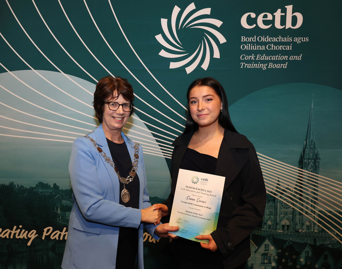 Councillor Margaret McDonnell, Deputy Lord Mayor, presenting a Student of the Year award to Emma Covaci, Carrigtwohill Community College.