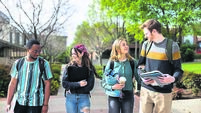 Diverse College Students Walking on Campus