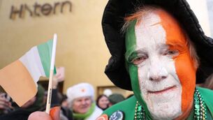 <p class="contextmenu internal_Caption">A man with his face painted in the colours of the Irish flag at a New York St Patrick’s Day parade. We need to understand what is meant by the colours in the tricolour today, says Kathriona Devereux</p>