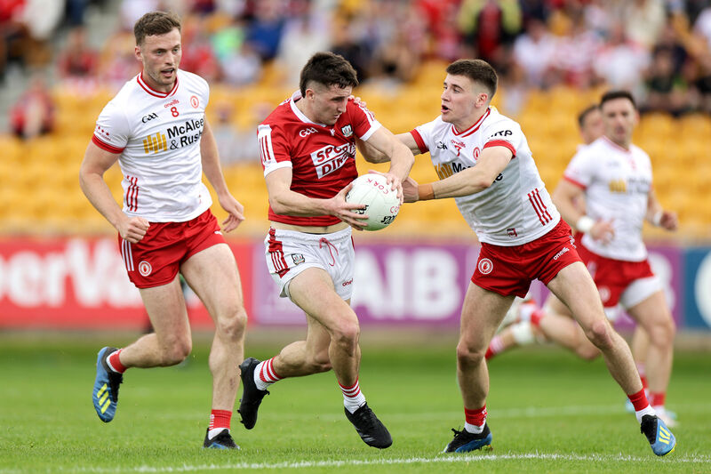 Cork's Chris Óg Jones with Niall Devlin and Brian Kennedy of Tyrone in 2024. Picture: INPHO/Laszlo Geczo
