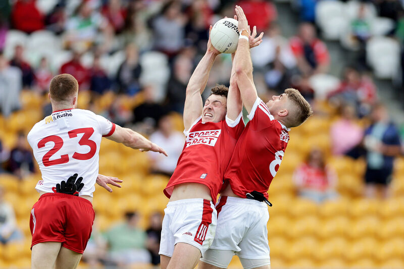 Cork's Daniel O'Mahony and Ian Maguire with Cathal McShane of Tyrone in 2024. Picture: INPHO/Laszlo Geczo