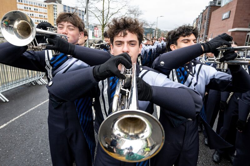 Trumpeters from the Texas McKinney High School Royal Pride Band prepare to perform at the meeting point ahead of the St Patrick’s Day Parade in Cork city. Picture: Chani Anderson.