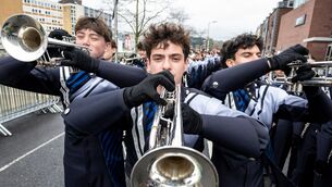 <p>Trumpeters from the Texas McKinney High School Royal Pride Band prepare to perform at the meeting point ahead of the St Patrick’s Day Parade in Cork city. Picture: Chani Anderson.</p>