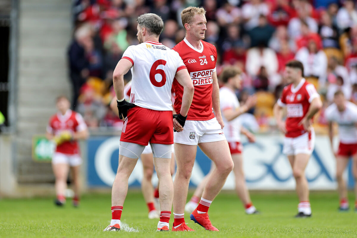 Cork's Ruairí Deane shakes hands with Mattie Donnelly of Tyrone in 2024. Picture: INPHO/Laszlo Geczo