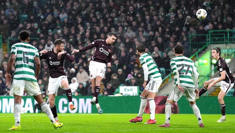 Hearts Oisin McEntee scores their second goal against Celtic during their league clash at Celtic Park. Picture: Andrew Milligan/PA Wire