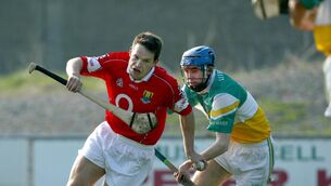 <p>Cork's Alan Browne looks to get away from Kevin Brady of Offaly in the 2003 Allianz HL meeting between the counties - Offaly's last win over the Rebels. Picture: Inpho/Morgan Treacy</p>