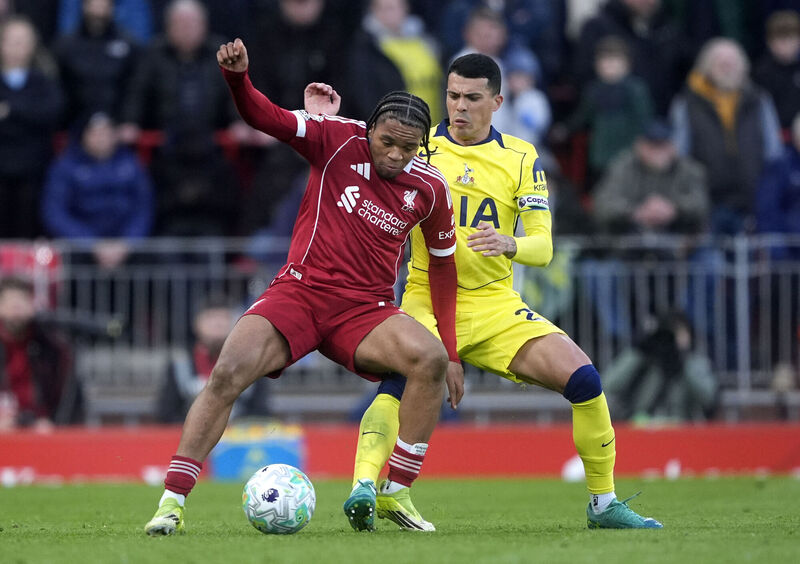 Liverpool's Rio Ngumoha (left) and Tottenham Hotspur's Pedro Porro battle for the ball during the Premier League match at Anfield, Liverpool. Picture: Peter Byrne/PA Wire