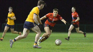 <p>LOCKED IN: Ciarán Santry, UCC, in action against DCU's Eoghan O'Connor during their Sigerson Cup quarter-final. Picture: Moya Nolan</p>