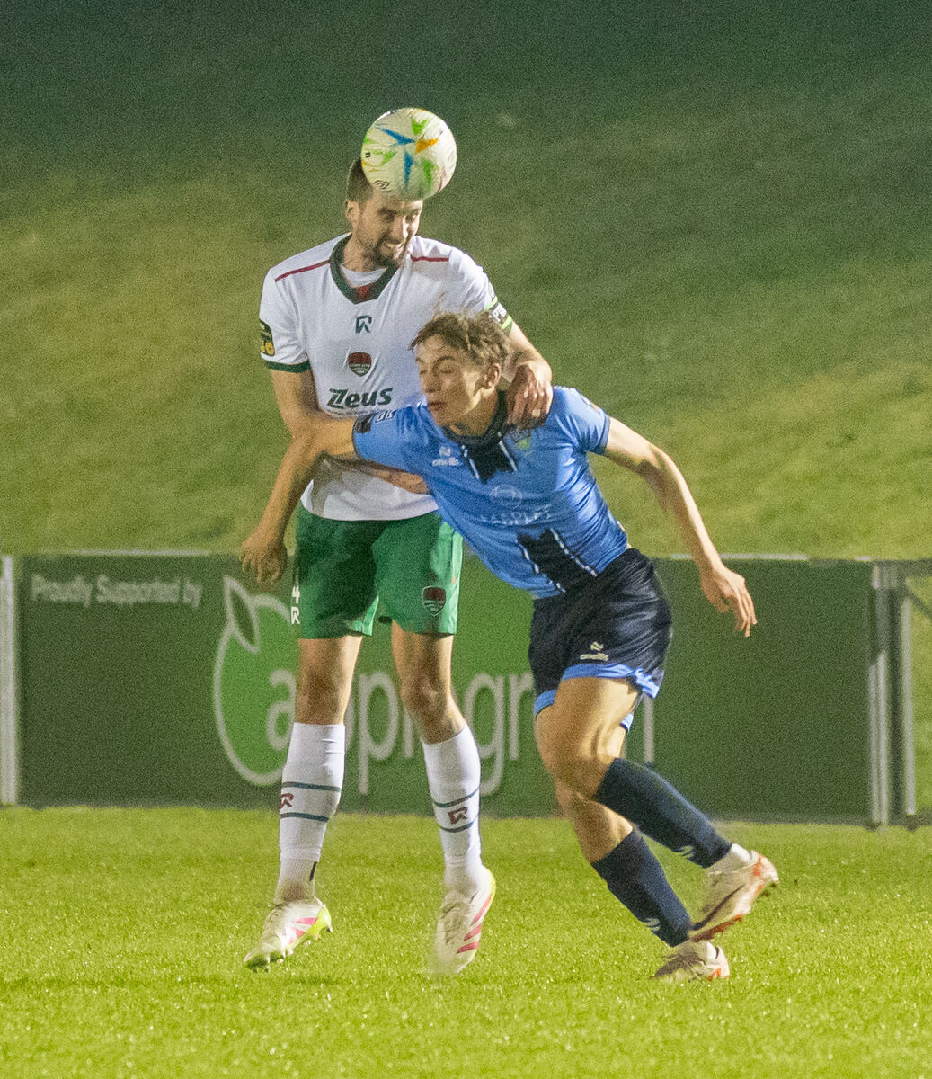 Cork City's Fiacre Kelleher and UCD's Hugh Smith 
