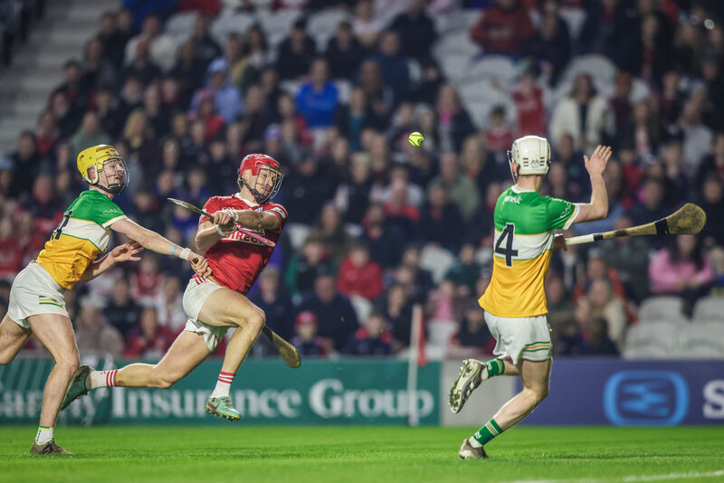 Cork's Alan Connolly gets a shot in as Offaly's Brecon Kavanagh looks to block. Picture: Inpho/David Ribeiro Cork's Alan Connolly gets a shot in as Offaly's Brecon Kavanagh looks to block. Picture: Inpho/David Ribeiro