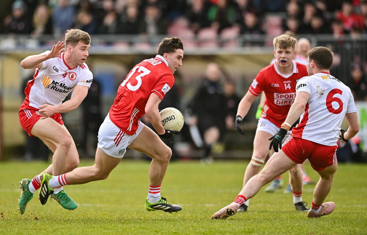 Chris Óg Jones of Cork in action against Cormac Quinn and Niall Devlin of Tyrone. Picture: Oliver McVeigh/Sportsfile