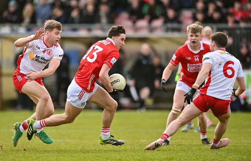 Chris Óg Jones of Cork in action against Cormac Quinn and Niall Devlin of Tyrone. Picture: Oliver McVeigh/Sportsfile Chris Óg Jones of Cork in action against Cormac Quinn and Niall Devlin of Tyrone. Picture: Oliver McVeigh/Sportsfile