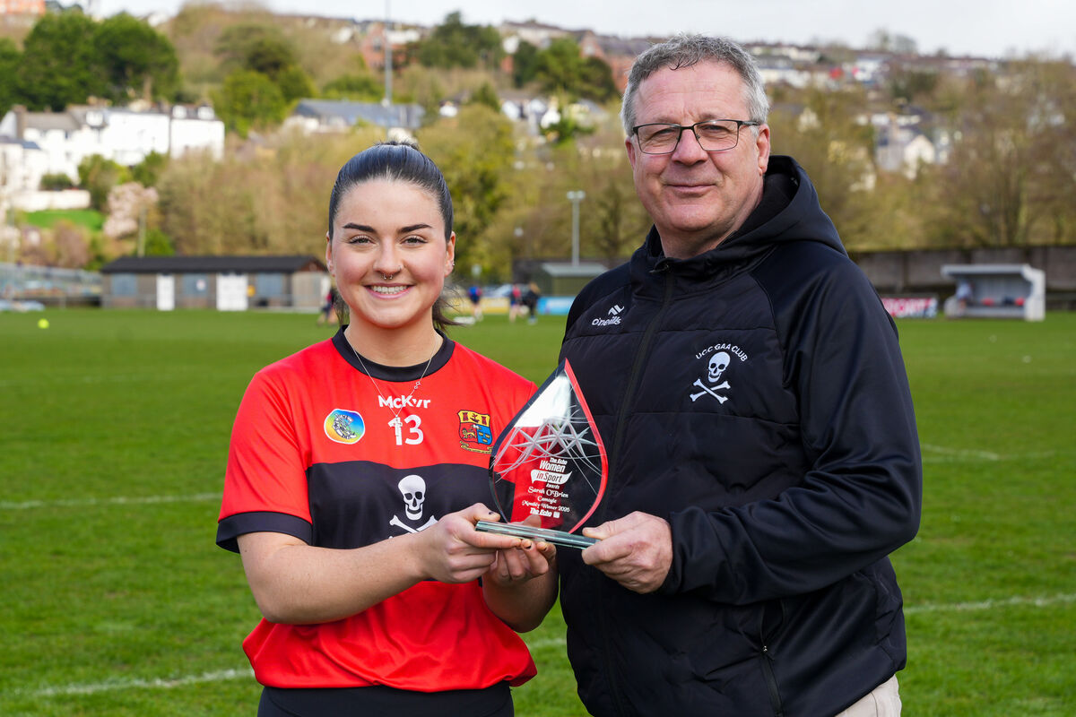 John Grainger, UCC Gaelic Games Development Officer, with Sarah O'Brien at the presentation of the February award to the camogie star. Picture: Noel Sweeney