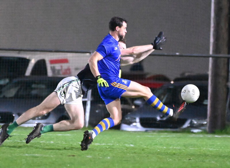 St Finbarr's Enda Dennehy is tackled by Nemo Rangers' Barry Cripps. Picture: Eddie O'Hare
