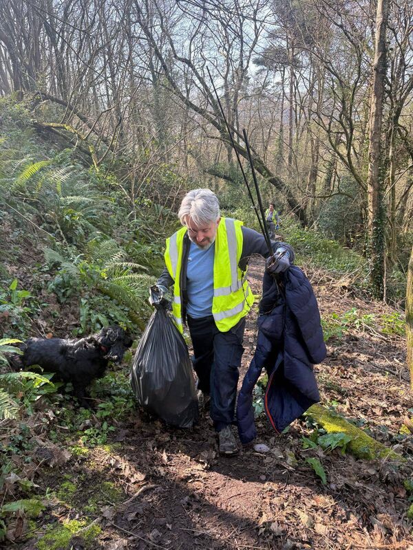 Volunteer Ken Rooney brings a fishing rod, golf jacket, and bag of rubbish from Doman’s Wood. Volunteer Ken Rooney brings a fishing rod, golf jacket, and bag of rubbish from Doman’s Wood.