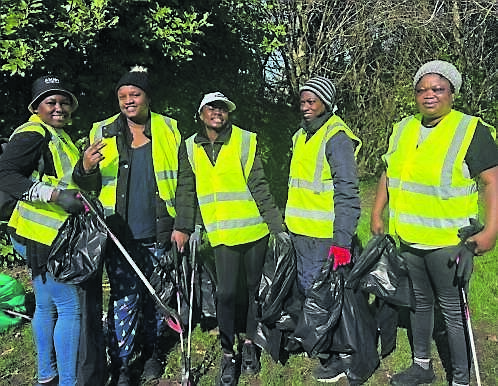 Volunteers at the Douglas Tidy Towns litter pick and biodiversity walk.