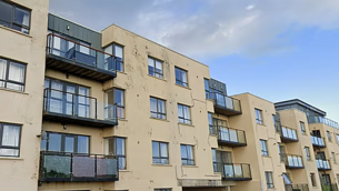 Balconies in housing complex where children fell 20ft being examined