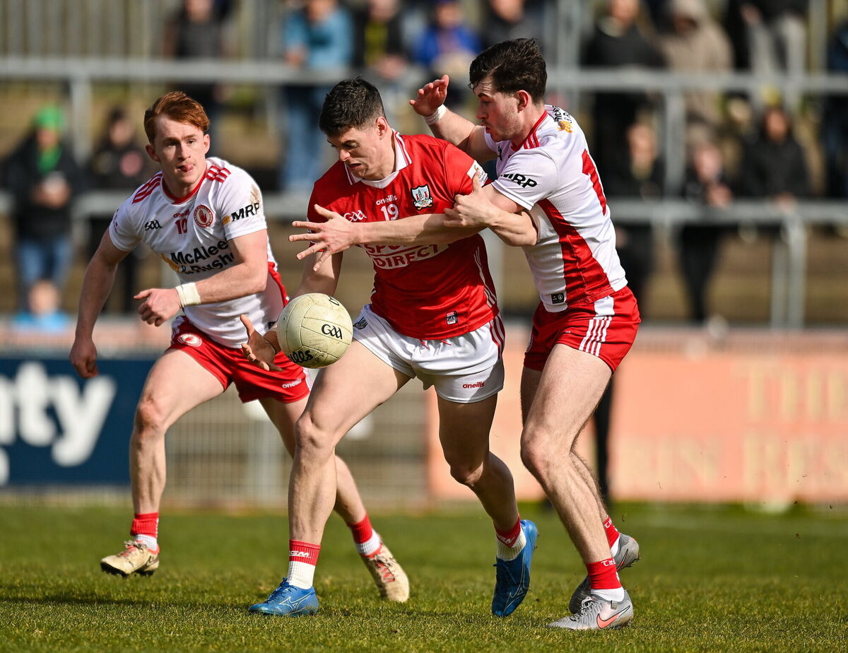Rory Maguire of Cork in action against Seanie O'Donnell and Ciarán Daly of Tyrone. Picture: Oliver McVeigh/Sportsfile