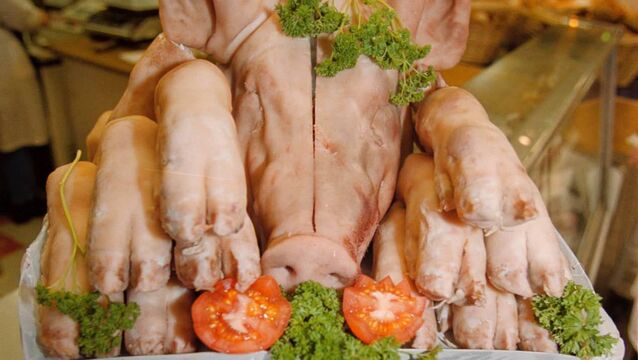 <p class="contextmenu internal_Caption">A pig’s head and crubeens (its feet) in a stall in the English Market - Jo Kerrigan wonders whether the name for the market is overdue a change!</p>