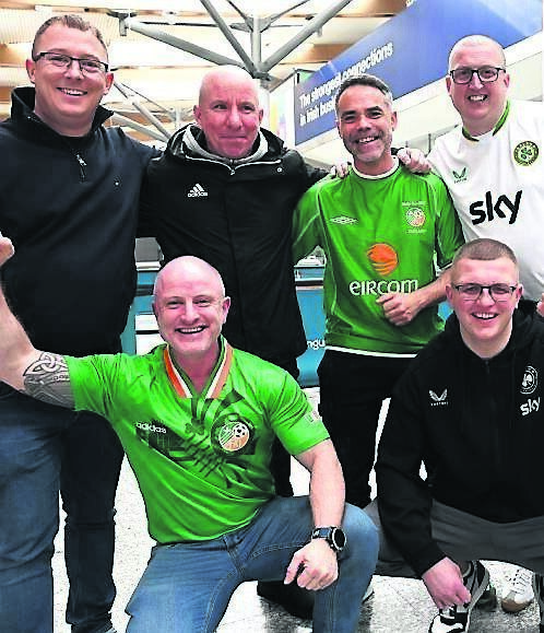 These fans are all smiles ahead of the match.