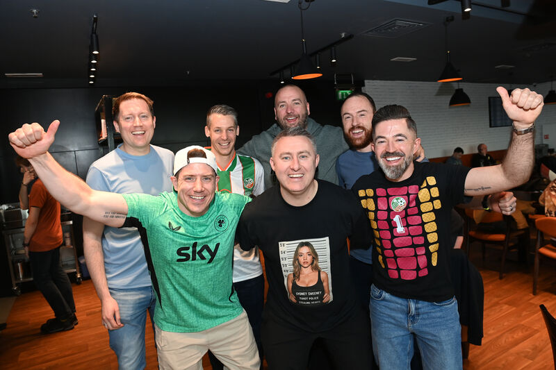  Republic of Ireland soccer fans Kilian O'Mahony, Dave O'Connell and Richard O'Brien with (rear) Peter Kelly, Ian Cullinane, Gary O'Shea and Niall Burke are ready for action at Cork Airport before boarding their Aer Lingus flight to Prague for the World Cup playoff match against Czechia. Picture; Larry Cummins