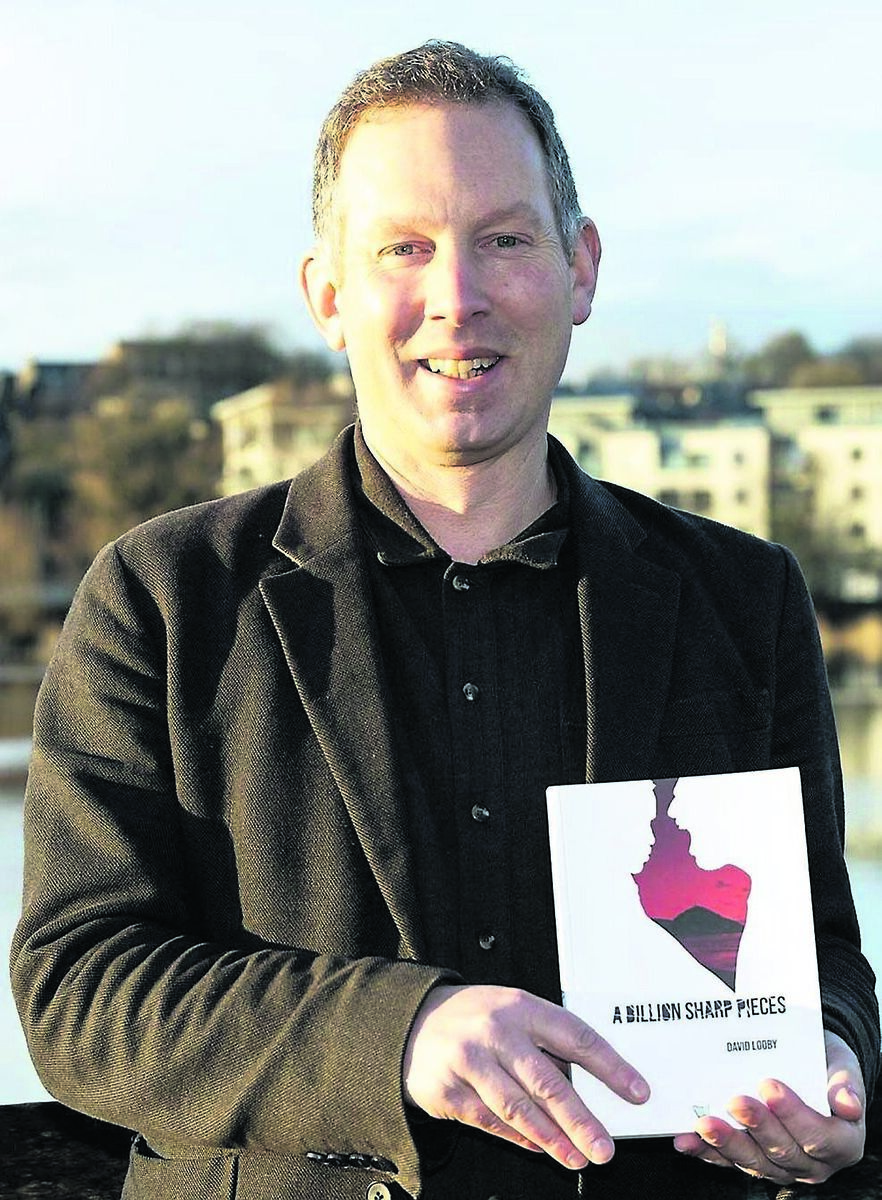 Cork author David Looby with his debut novel, A Billion Sharp Pieces Cork author David Looby with his debut novel, A Billion Sharp Pieces