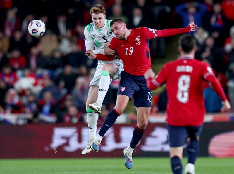 Ireland's Jake O'Brien battling in the air with Tomáš Chorý. Picture: INPHO/Ryan Byrne