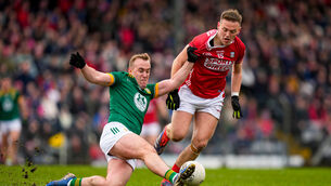 <p>Ronan Ryan of Meath and Steven Sherlock of Cork in action. Picture: INPHO/James Lawlor</p>