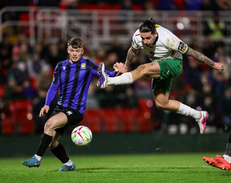 Ruairí Keating of Cork City in action against Kyle O'Connor of Athlone Town. Picture: Michael P Ryan/Sportsfile
