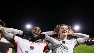 <p>FLYING FORM: AJ Bridge of Cork City celebrates after scoring his side's fourth goal with teammate Hans Mpongo at Turner's Cross. Picture: Michael P Ryan/Sportsfile</p> <p>FLYING FORM: AJ Bridge of Cork City celebrates after scoring his side's fourth goal with teammate Hans Mpongo at Turner's Cross. Picture: Michael P Ryan/Sportsfile</p>