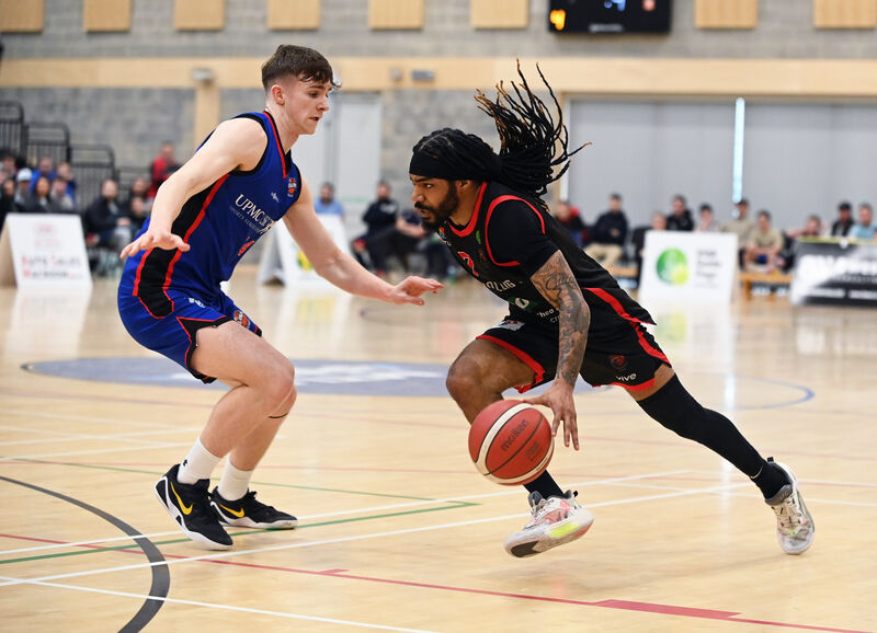 Ballincollig's Latrell Jossell takes on Éanna's Adam Charles. Picture: Eddie O'Hare Ballincollig's Latrell Jossell takes on Éanna's Adam Charles. Picture: Eddie O'Hare