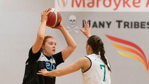 <p>Faye McDonnell of Career Decisions UCC Glanmire looks for a pass from Flomax Liffey Celtics Katie Williamson at the Mardyke. Picture: Howard Crowdy</p>