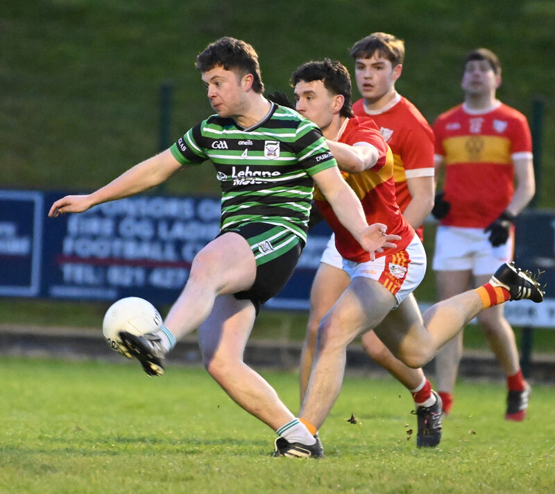 Douglas' Dylan Ward shoots from Éire Óg's Daire McCarthy during the McCarthy Insurance Group SFL Division 1 game at Ovens. Picture: Eddie O'Hare