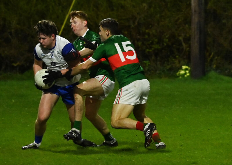 Knocknagree's Neil O'Connor under pressure from Clonakilty's Ross Mannix and Sean McEvoy. Picture: Martin Walsh.