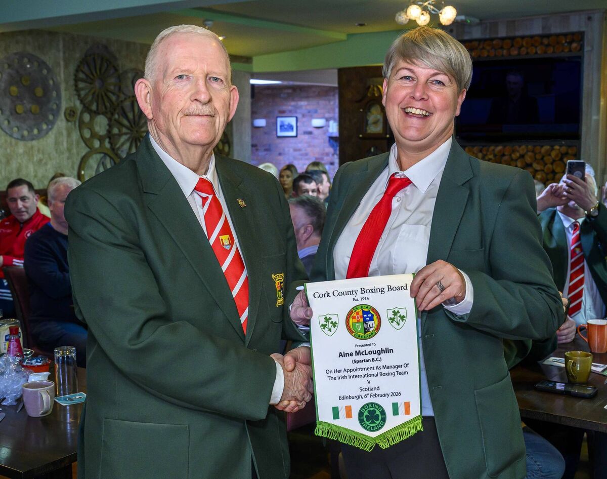 President of the Cork County Boxing Board Michael O’Brien presenting a commemorative pennant to Áine McLaughlin to mark her appointment as Irish Team Manager for a recent international against Scotland in Edinburgh. Picture: Doug Minihane