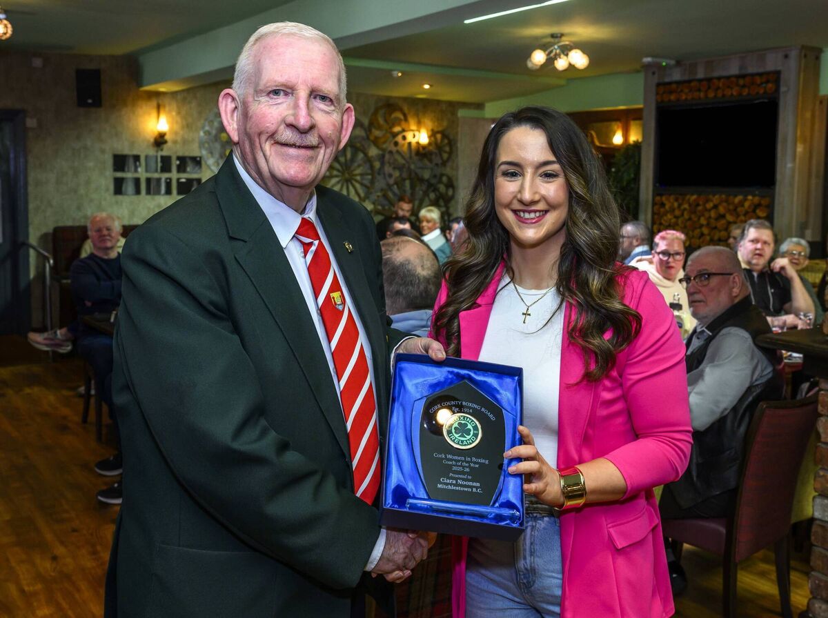 Cork Women’s Boxing Coach Of The Year, Ciara Noonan receiving her award from Michael O’Brien of the Cork County Boxing Board at the breakfast in the Muskerry Arms, Blarney, last Saturday. Picture: Doug Minihane