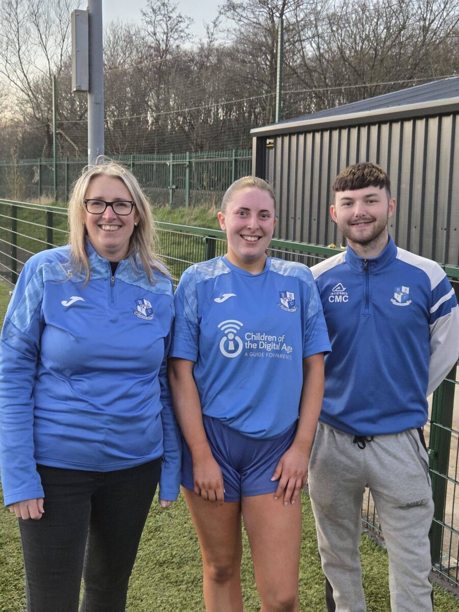  Chairperson Lorraine Sloane pictured with Blackstone Rovers first ever women’s goal scorer Rianna Kelleher Murphy with coach Ciaran McCarthy